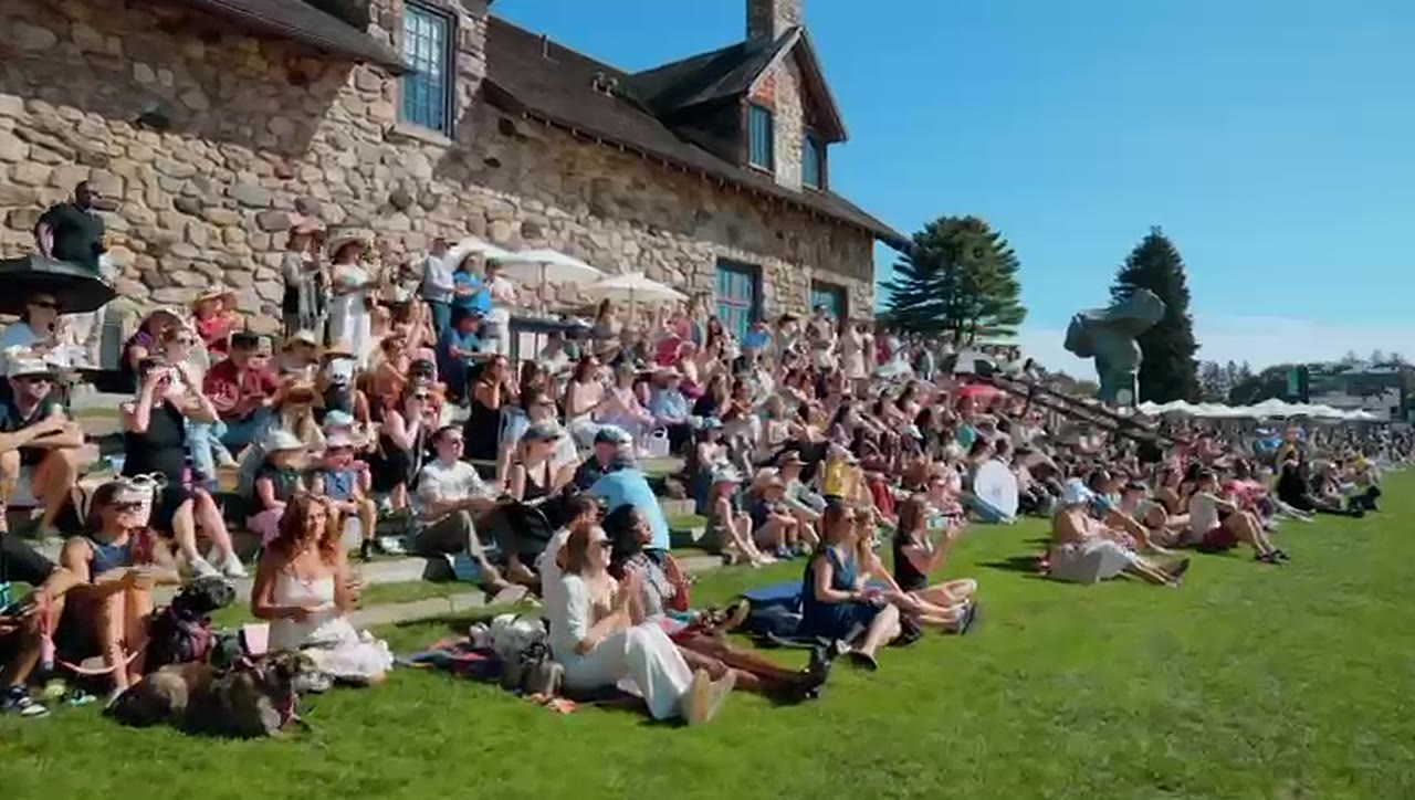 Spectators on the lawn at the Trelawny Stadium, 2025